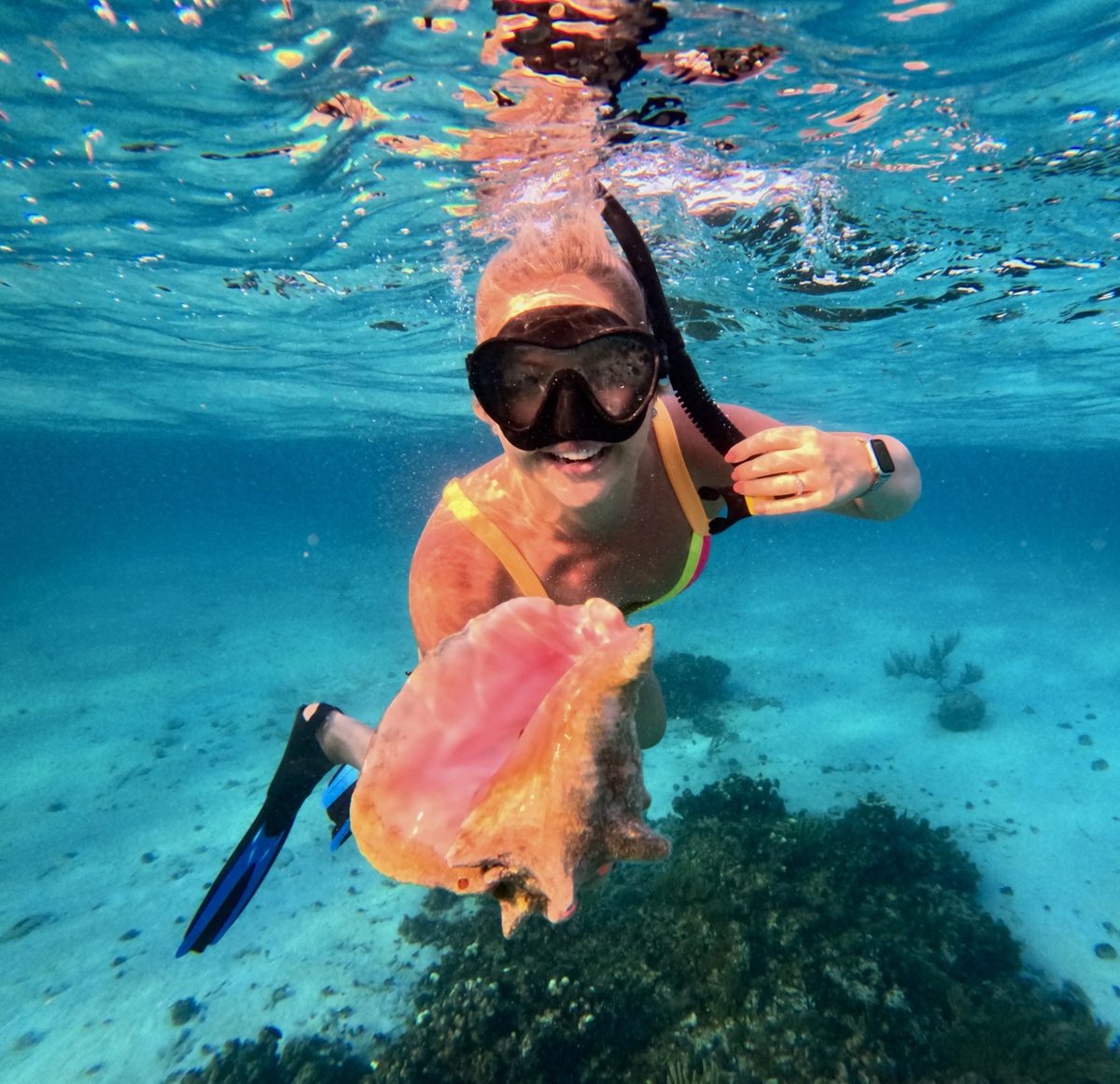Adele snorkeling in clear blue water